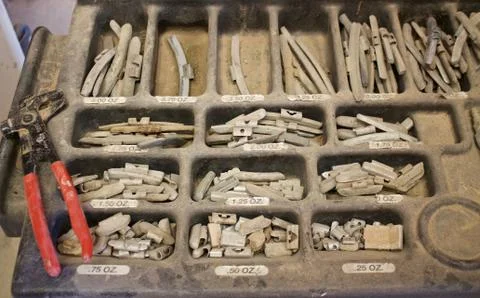 Tray of Assorted Wheel Weights Stock Photos