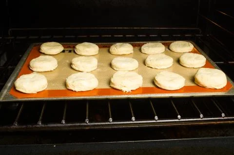 Tray of biscuits in the oven Foto stock