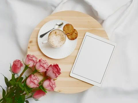 Tray with breakfast on a bed with tablet. 3d rendering Stock Illustration