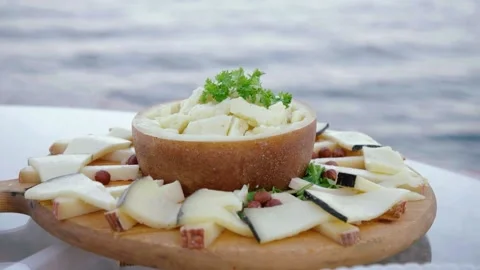 A tray of cheese facing the sea Stock Footage 167699628
