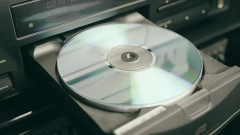 A tray with a compact disc comes out of a CD player in a hi-fi music center Video stock 287951797