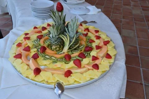 Tray with different varieties of sliced fruit Stock Photos