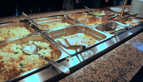 Tray with first courses of spaghetti or rice in the company canteen Stock Photos