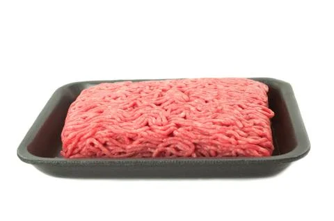A tray of fresh lean ground beef from supermarket isolated on white backgroun Stock Photos