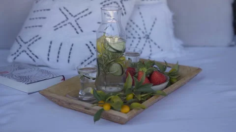 Tray with herbal tea and berries on a white sheet Stock Footage 260221111