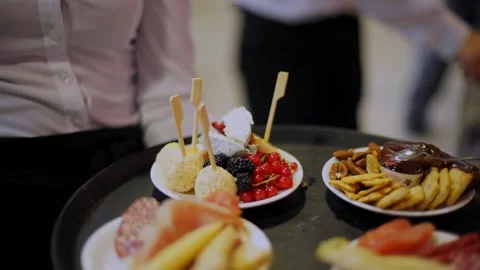 Tray with jamon, cheese cubes, salami, currants and blackberries. Stock Footage 159369860