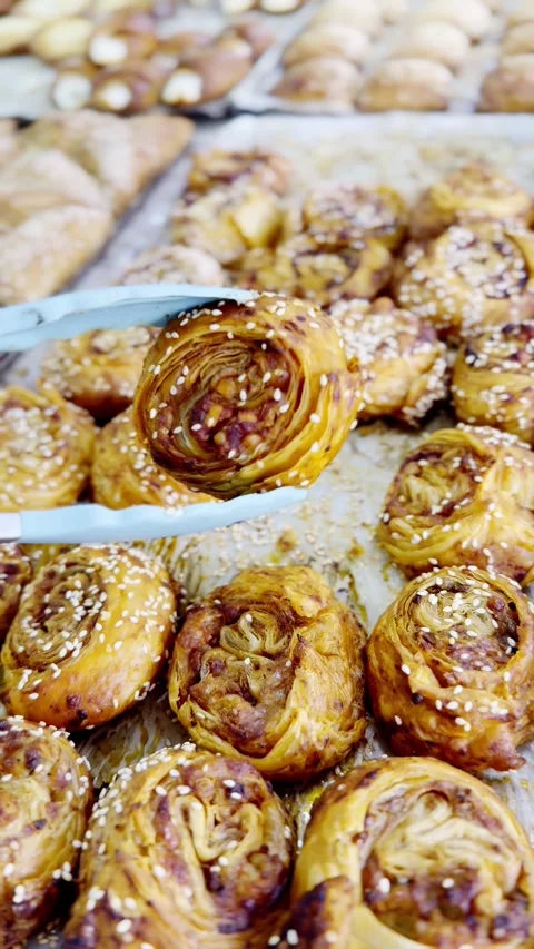 A tray of pastries with a knife on it Stock Footage 325141054