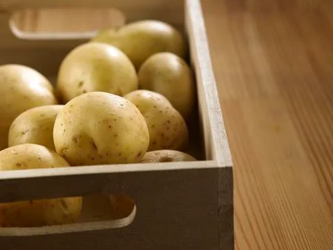 Tray of potatoes Stock Photos