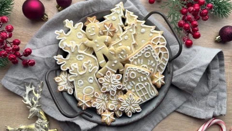 Tray presenting christmas cookies surrounded by decorations Stock Footage 294556507