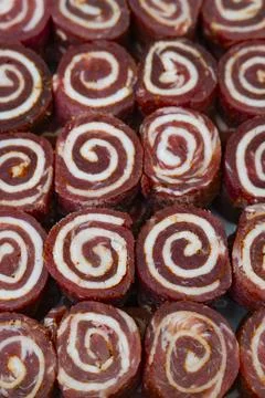 Tray of Rolled Meat with Spiral Pattern Stock Photos