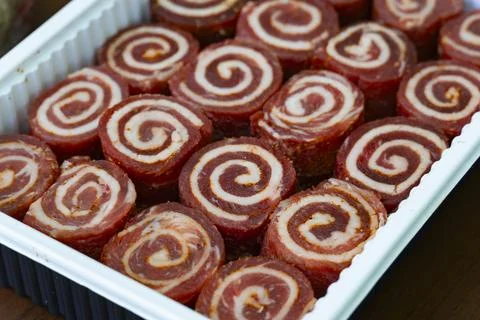 Tray of Rolled Meat with Spiral Pattern Stock Photos