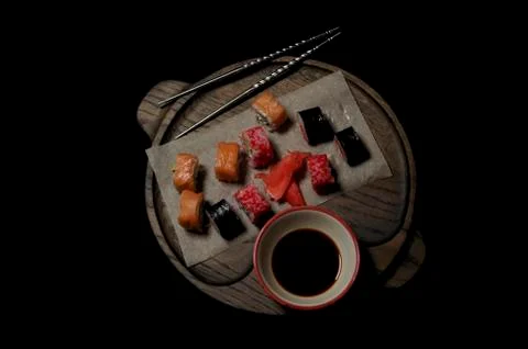 Tray with sushi on black background Stock Photos