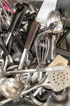 Tray of various old kitchen cooking utensils Stock Photos