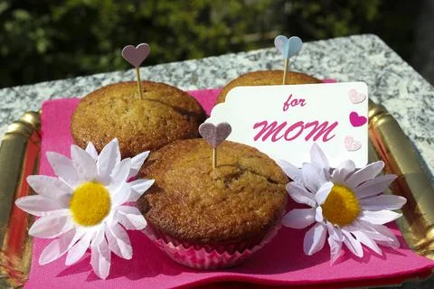 Trays with 3 muffins for Mother's Day, with decorations Stock Photos