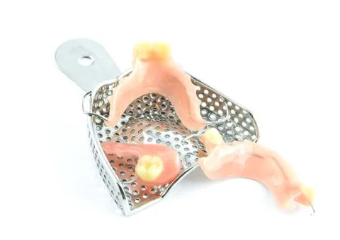 Trays with denture Stock Photos