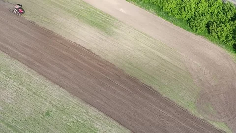 Trctor on field Video stock 242910280