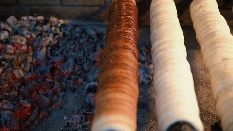 Trdelnik bake on coals. Stock Footage 71373098