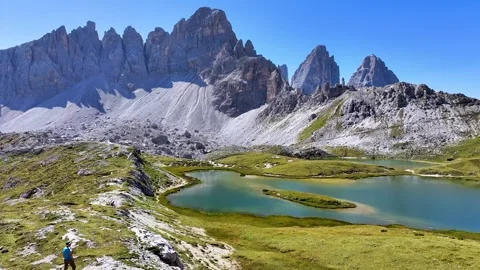 Tre Cime di Lavaredo Lakes Man 04 | Refugio Locatelli | Italian Dolomites | 4K Stock Footage 259920041