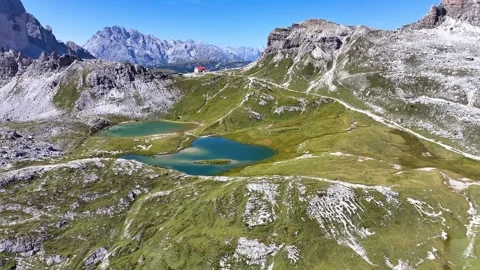 Tre Cime di Lavaredo Lakes 07 | Refugio Locatelli | Italian Dolomites | 4K Drone Stock Footage 259920155