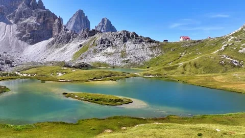 Tre Cime di Lavaredo Lakes Man 01 | Refugio Locatelli | Italian Dolomites | 4K Stock Footage 259920179