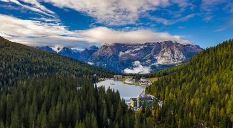 Tre Cime di Lavaredo peaks seen from Misurina lake in Dolomites, Italy in win Stock Photos
