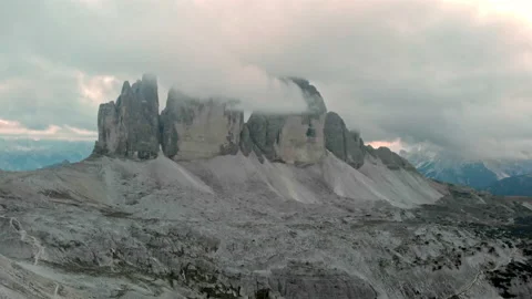 Tre Cime di Lavaredo at sunset with clouds. Three peaks in Dolomites mountains Stock Footage 151284939