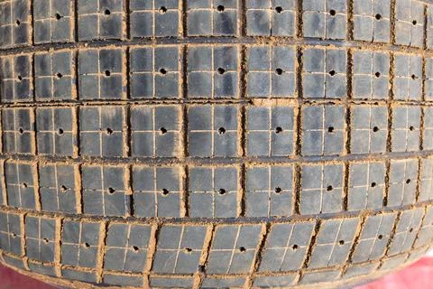 Tread pattern on large rubber speedway tyres in the pit area before a race 스톡 사진