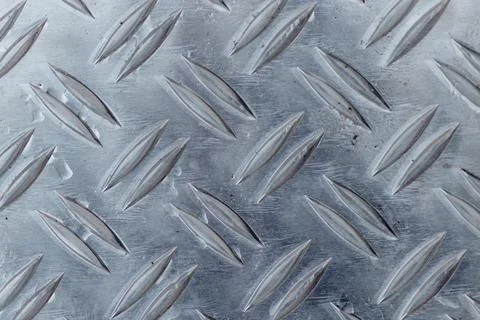 Tread plate texture creating non-slip metal surface Stock Photos