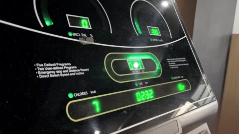Treadmill Console Display Showing Exercise Metrics and Safety Advice Stock Footage 307797003