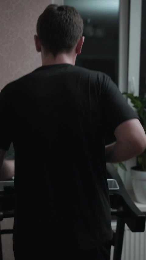 Treadmill is a great option for home workouts, enhancing cardiovascular health Stock Footage 305570366