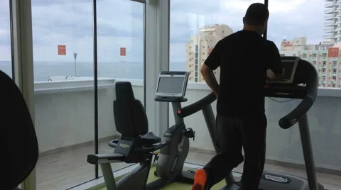 Treadmill in a gym with seaview Stock Footage 44452117