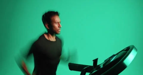 Treadmill, running and man in studio for fitness, training and fast runner with Stock Footage 330990078
