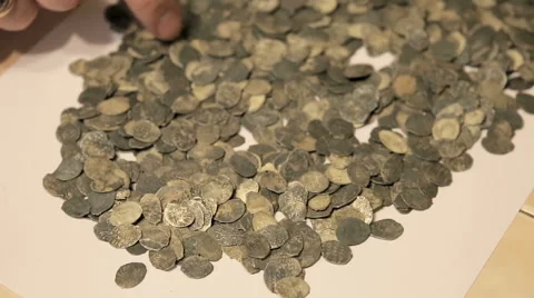 The treasure of ancient coins on the table Stock Footage 58869258