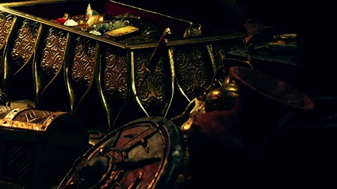 Treasure box filled with gold and valuable items in a dark room Stock Footage 340016502