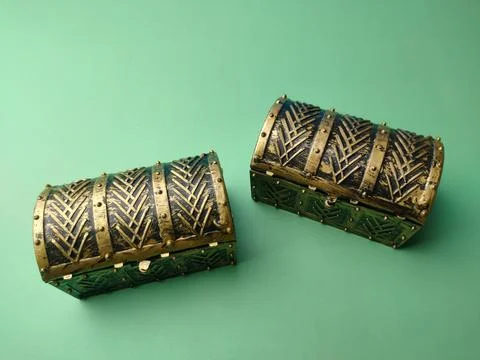 Treasure box on a soft green Stock Photos