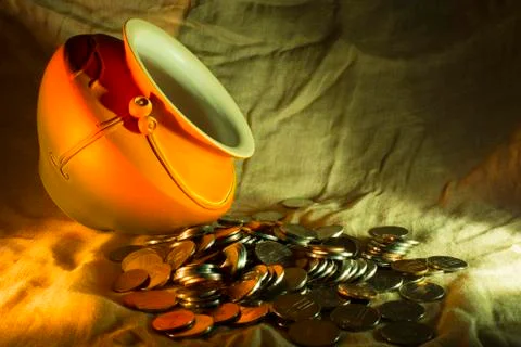 Treasure from ceramic pot Stock Photos