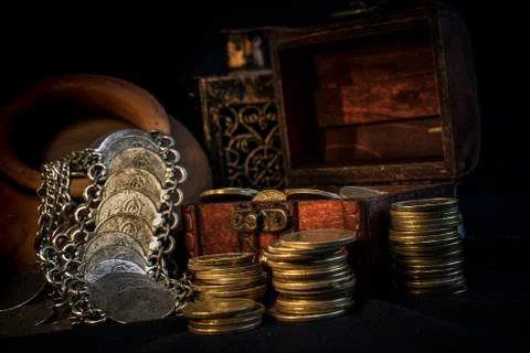 Treasure chest and candle Stock Photos