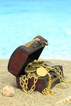 Treasure chest on a beach Stock Photos