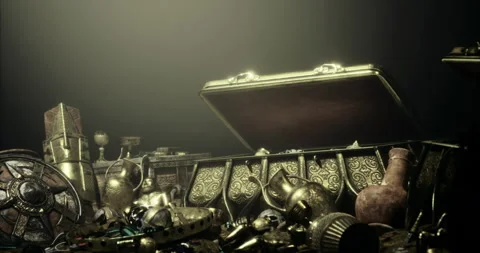 Treasure chest filled with ancient artifacts and gleaming gold in low light Video stock 306039324