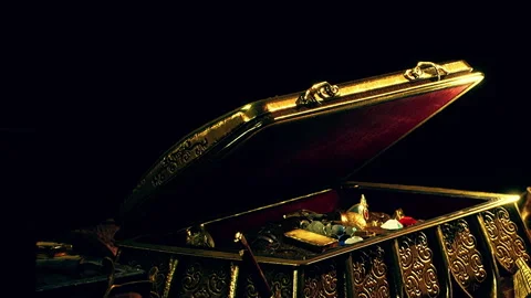 Treasure chest filled with assorted valuable items and gems on display Stock Footage 340017080