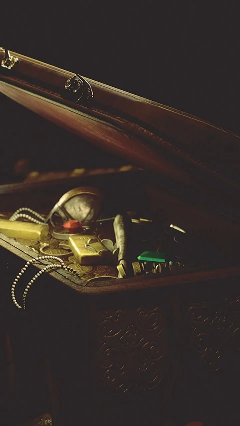Treasure chest filled with various items and tools from unknown origin Stock Footage 334882469