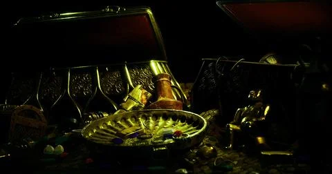 Treasure chests filled with ancient artifacts and colorful gemstones Illustrazione stock