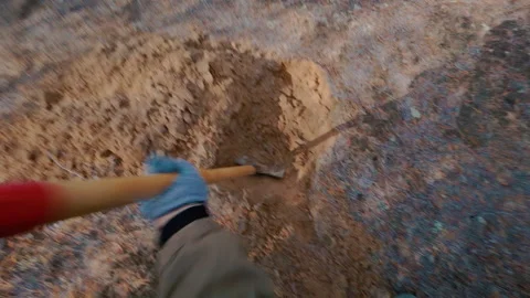 A treasure hunter is looking for treasures in the forest. Treasure search. Stock Footage 318310131