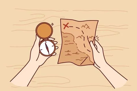 Treasure map and compass in hands of man looking for expensive jewels lost at Stock Illustration