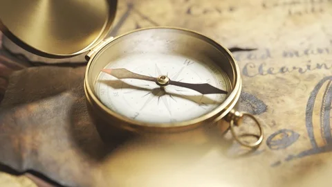 Treasure map with treasure spot marked by x sign seen through a magnifying glass Stock Footage 110097418