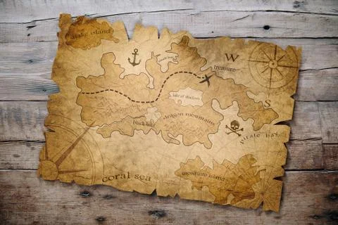 Treasure map on wooden table Stock Photos