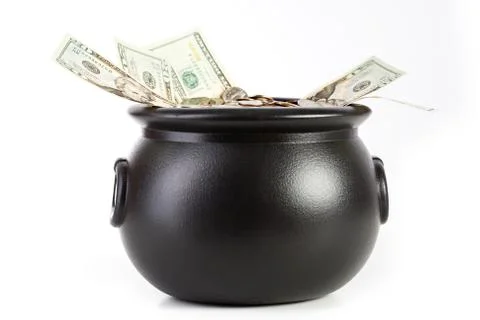 Treasure: Pot Overflowing with US Currency Stock Photos