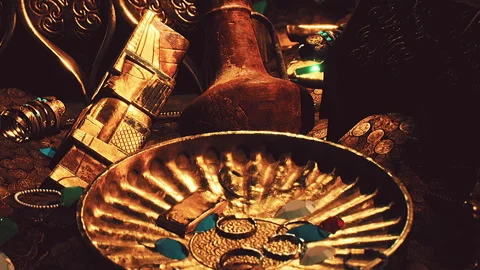 Treasures and artifacts displayed on a table during an exhibit Stock Footage 340016496