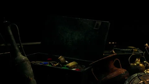 Treasures inside a dark box with various objects and artifacts Stock Footage 344399777