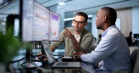 Treasury Manager Analyzes Real-time Cash Flow Dashboard On Laptop Screen. Stock Photos
